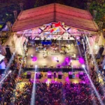 pexels photo 3941286 3941286 Aerial view of a lively outdoor concert in Banten, Indonesia with colorful stage lights.